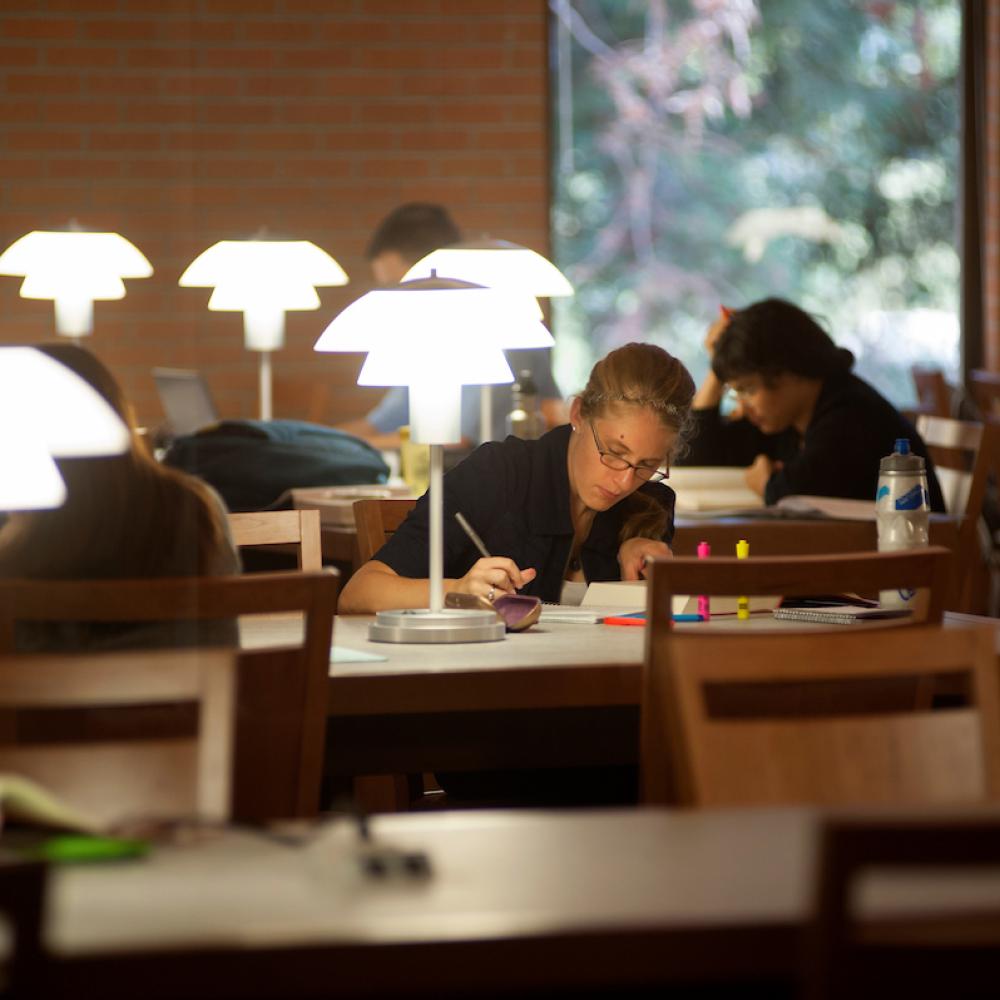 student studying in law library