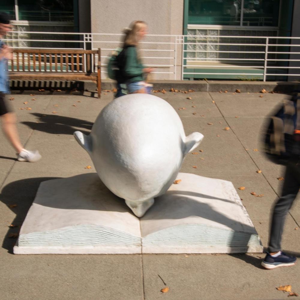 Egghead sculpture in front of Shields Library