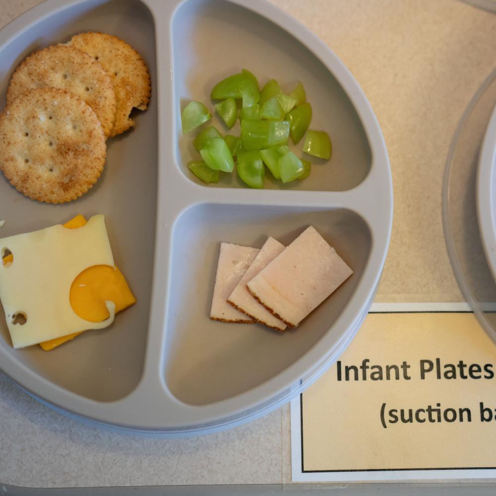 Close-up of a child's plate with food