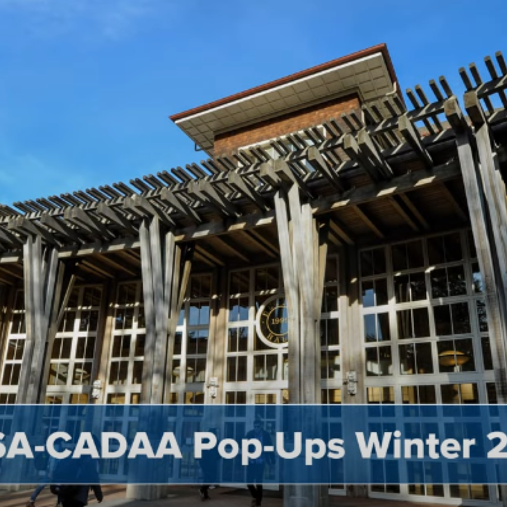 Image of the front of Dutton Hall with "FAFSA-CADAA Pop-Ups Winter 2025" in text