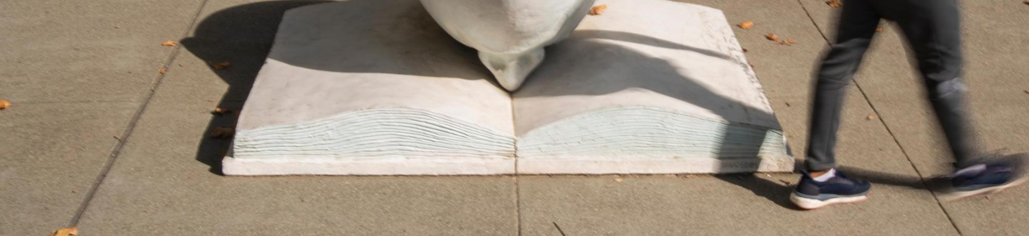 Egghead sculpture in front of Shields Library