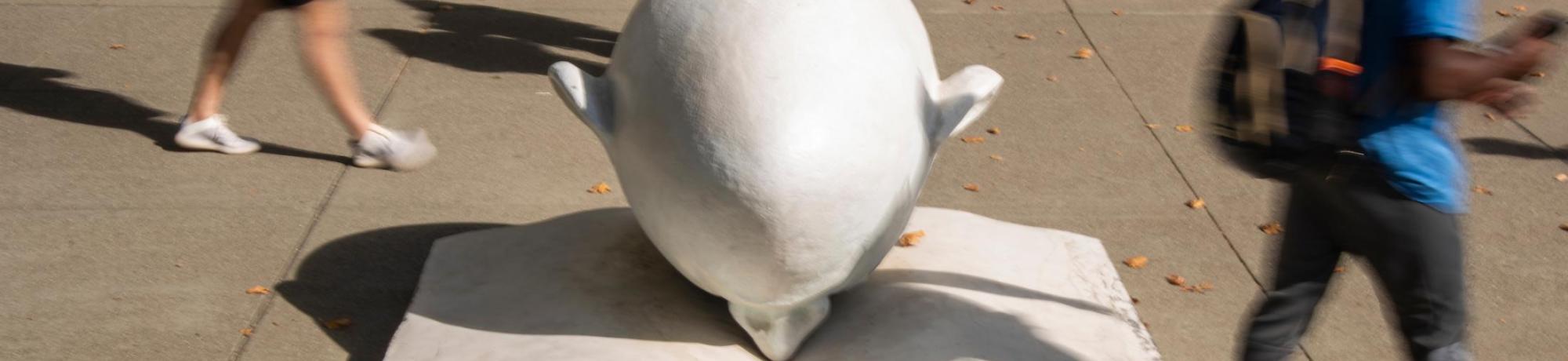 Egghead sculpture in front of Shields Library