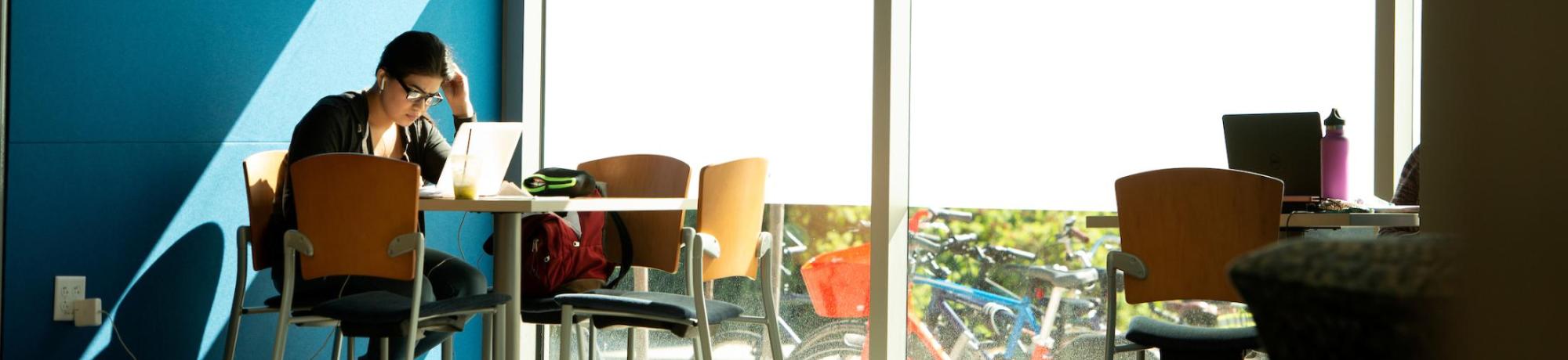 Student inside California Hall