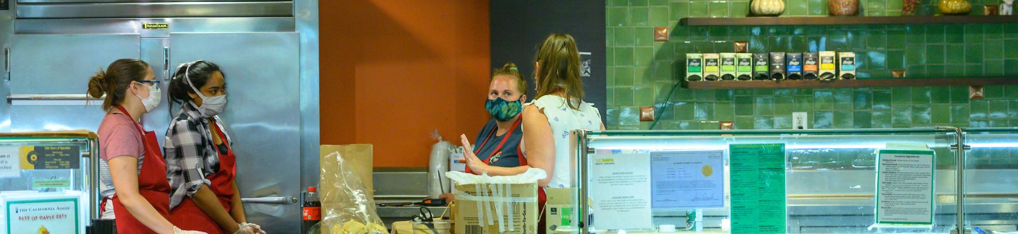 Student and career staff at work in the MU food court